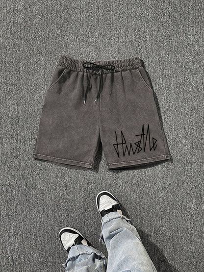 Short homme casual style urbain avec imprimé "Hustle" – idéal pour le streetwear et la détente