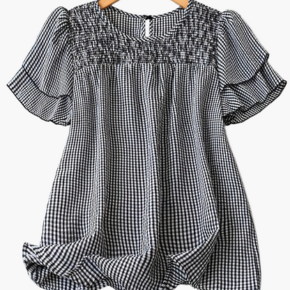 Elegant style feminine polka dot blouse with short sleeves and round neck for summer