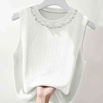 Elegante dames mouwloze top met parelmoerlook en ronde hals, geschikt voor uitgaan of kantoor