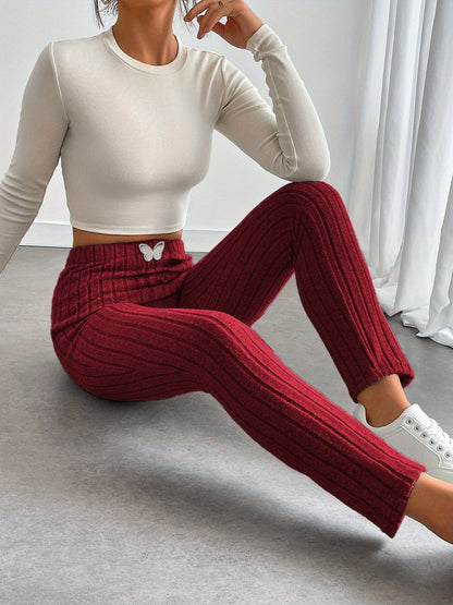 Legging côtelé gris clair taille haute avec détail papillon