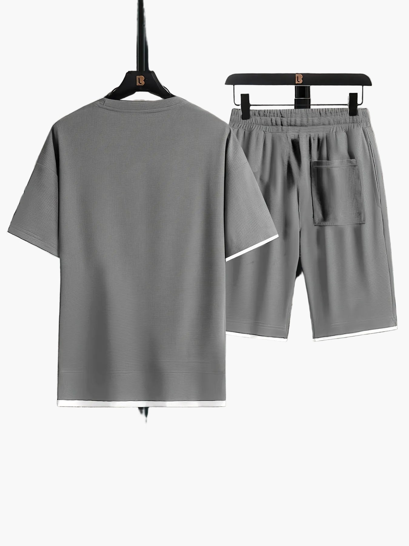 Completo uomo informale due pezzi maglietta larga e pantaloncini stile urbano ideale per relax e uscite