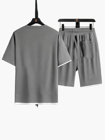 Completo uomo informale due pezzi maglietta larga e pantaloncini stile urbano ideale per relax e uscite