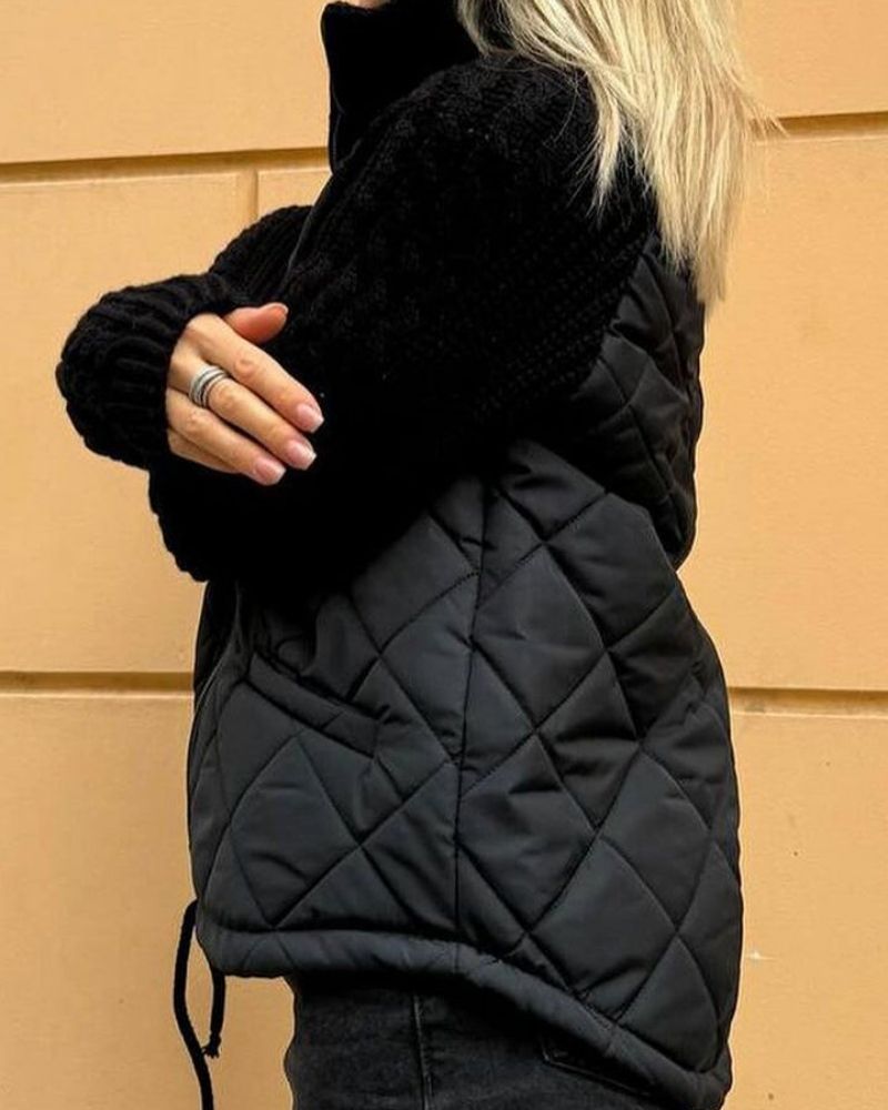 Women's quilted jacket with knitted sleeves and stand-up collar