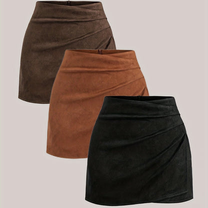 Mini-jupe plissée femme effet suédine marron foncé, camel et noir