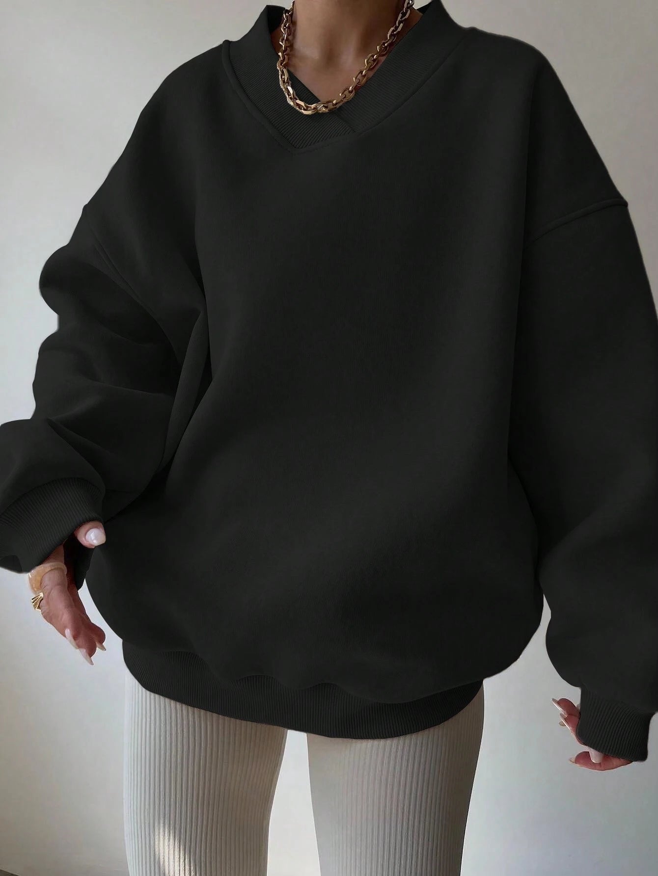 Pull col V femme noir décontracté manches longues