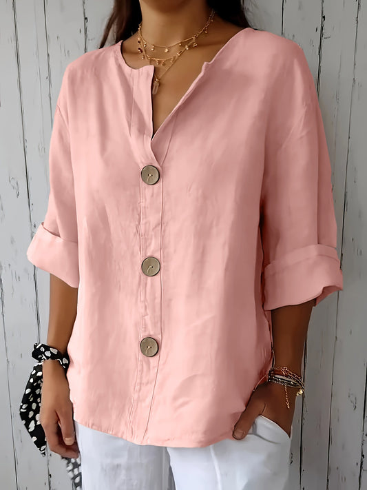 Afslappet damebluse med knapper i elegant og alsidig stil