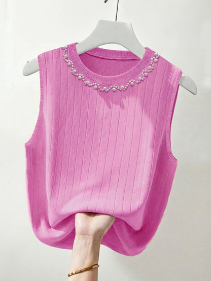 Elegante dames mouwloze top met parelmoerlook en ronde hals, geschikt voor uitgaan of kantoor