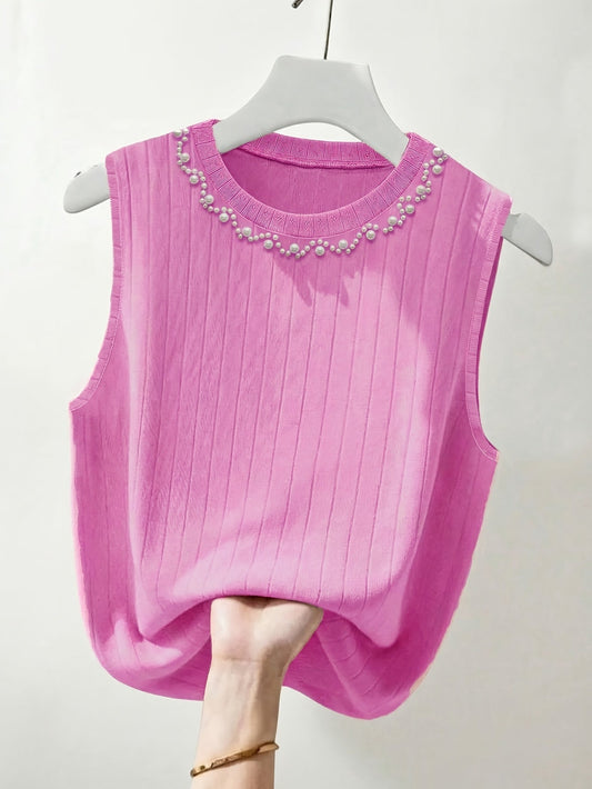 Elegant sleeveless tank top for women with pearl-style round neck, perfect for outings or office