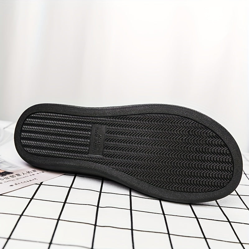 Pantoufles d'intérieur homme noires doublées, motif texturé discret, confortables et chaudes