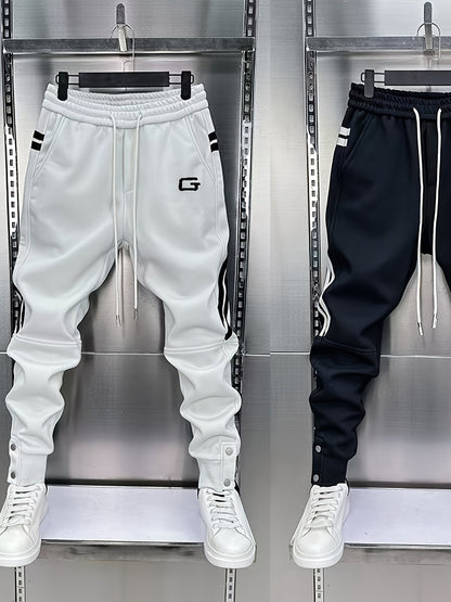 Pantalon de jogging homme avec cordon de serrage, rayures latérales et boutons pression, coupe fuselée
