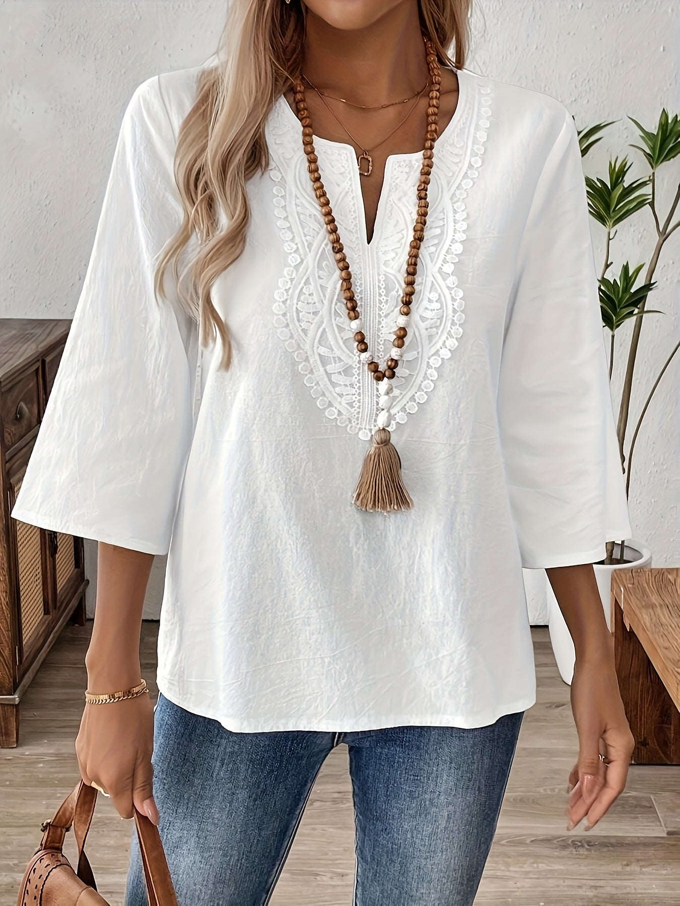 Blus för kvinnor i bohemisk chic stil med långa ärmar och broderi för en avslappnad och elegant look