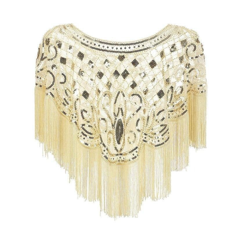 Elegant damesjal med pailletter, frynser og skinnende gulddetaljer i creme