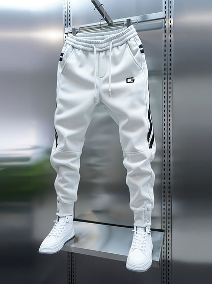 Pantalon de jogging homme avec cordon de serrage, rayures latérales et boutons pression, coupe fuselée