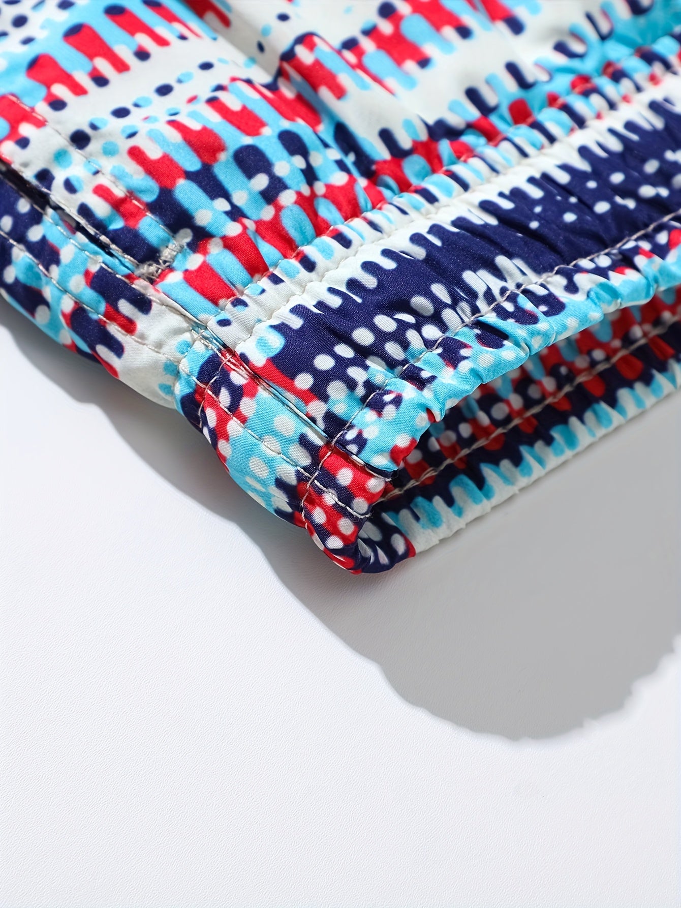 Short de bain homme style sportif à imprimé graphique pour la plage et la piscine