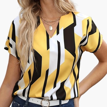 Women's vintage-style blouse with geometric pattern, ideal for everyday wear or the office