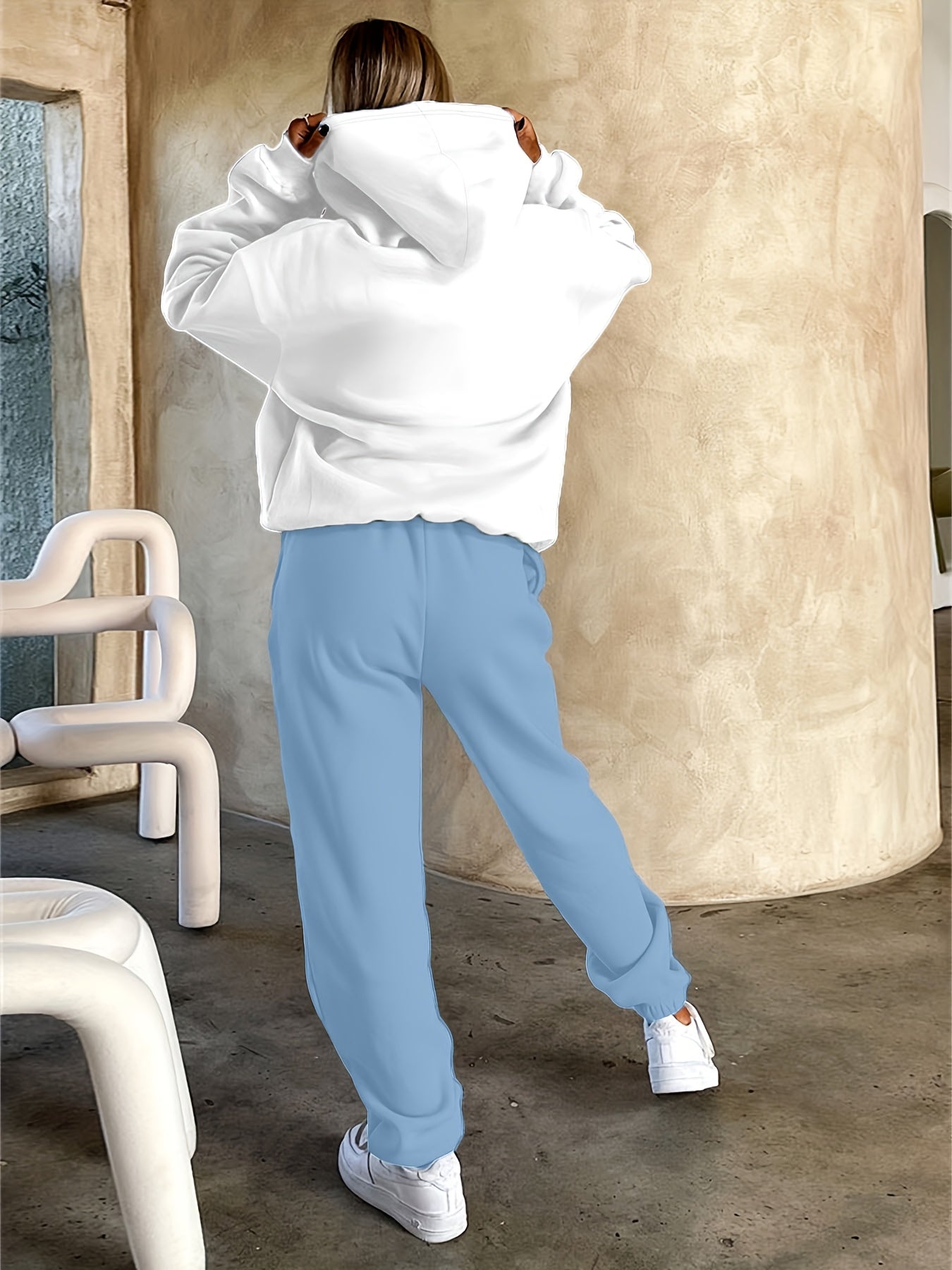 Ensemble survêtement femme blanc et violet motif géométrique
