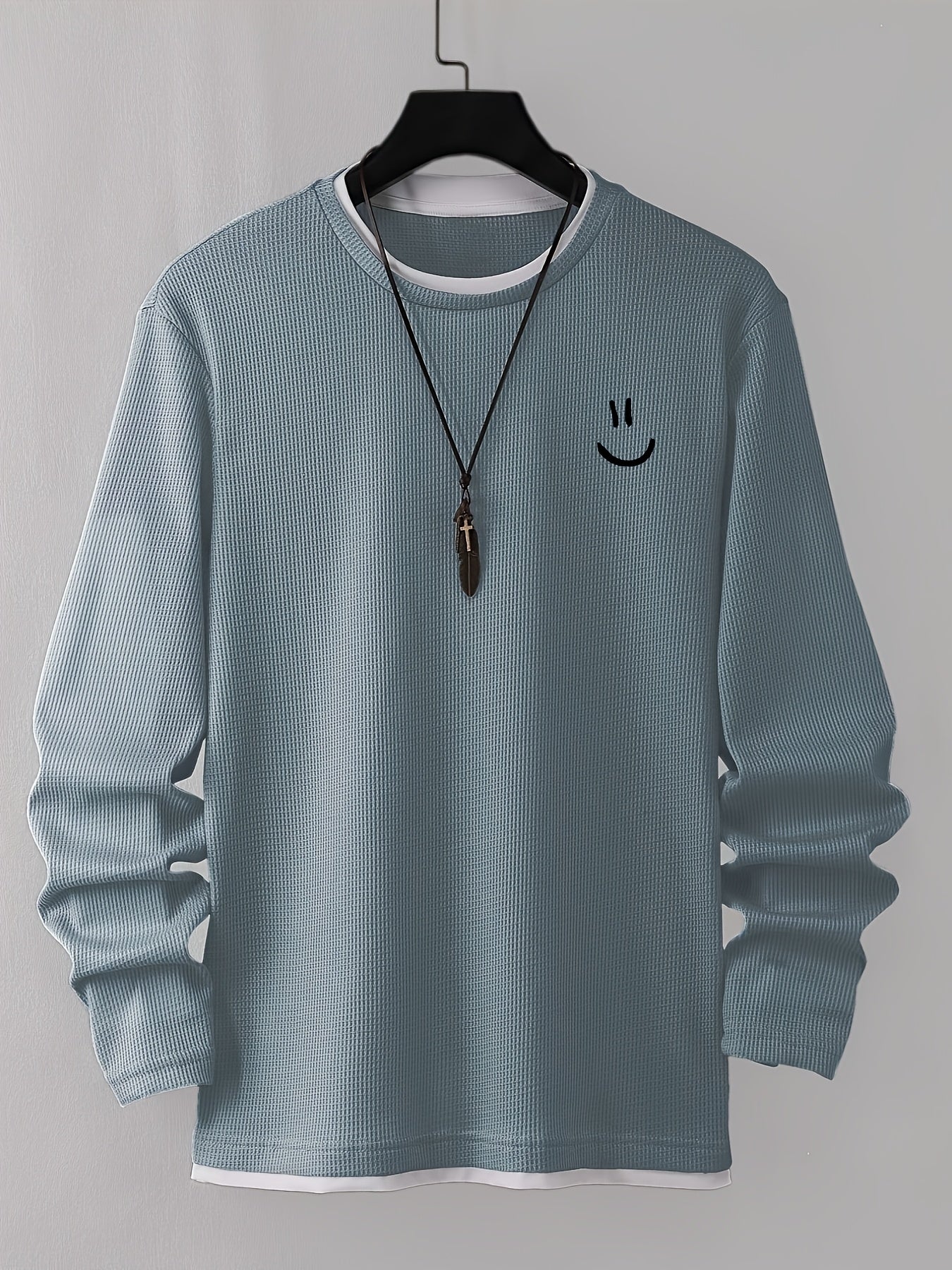 Pull homme texturé gaufré manches longues imprimé smiley col rond