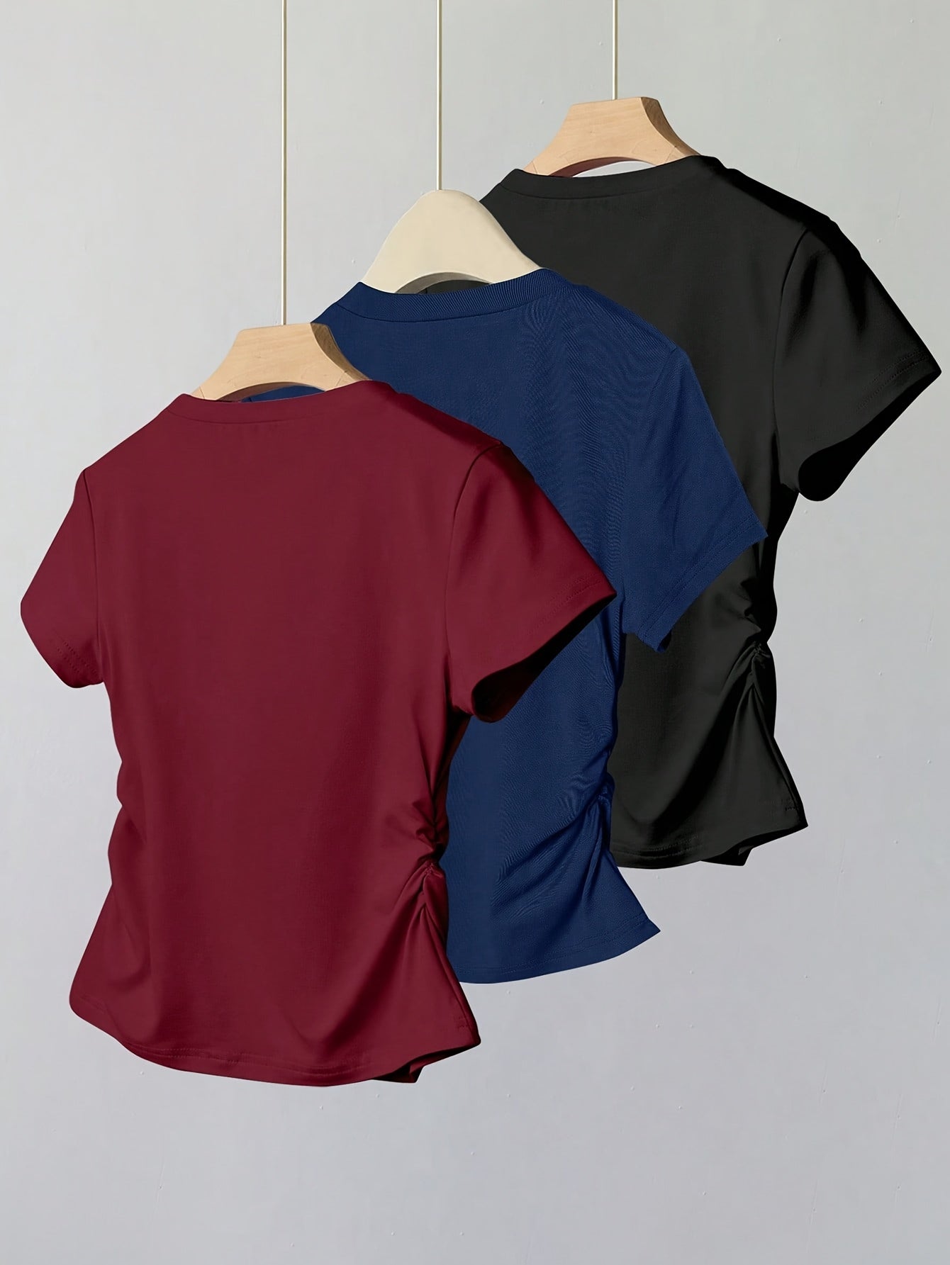 T-shirt femme casual chic à manches courtes avec nœud brodé, style élégant pour usage quotidien