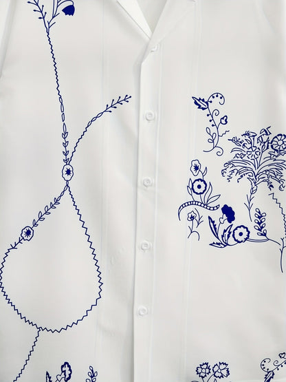 Herreskjorte i resortstil med korte ærmer og moderne grafisk blomsterprint