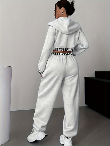 Ensemble survêtement femme crop top à capuche et pantalon large couleur unie