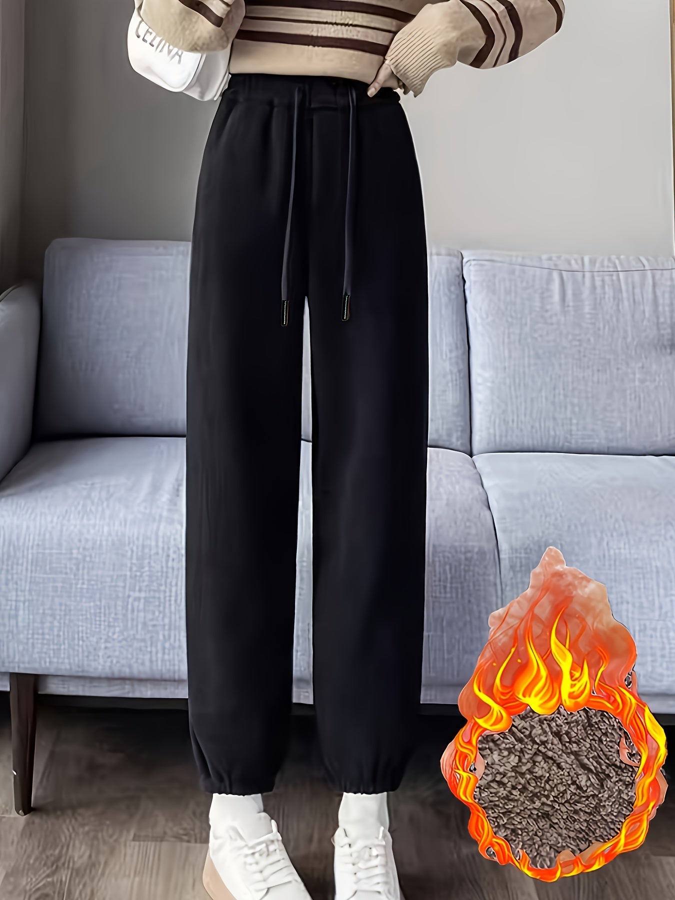 Pantalon en velours côtelé noir doublé polaire coupe ample