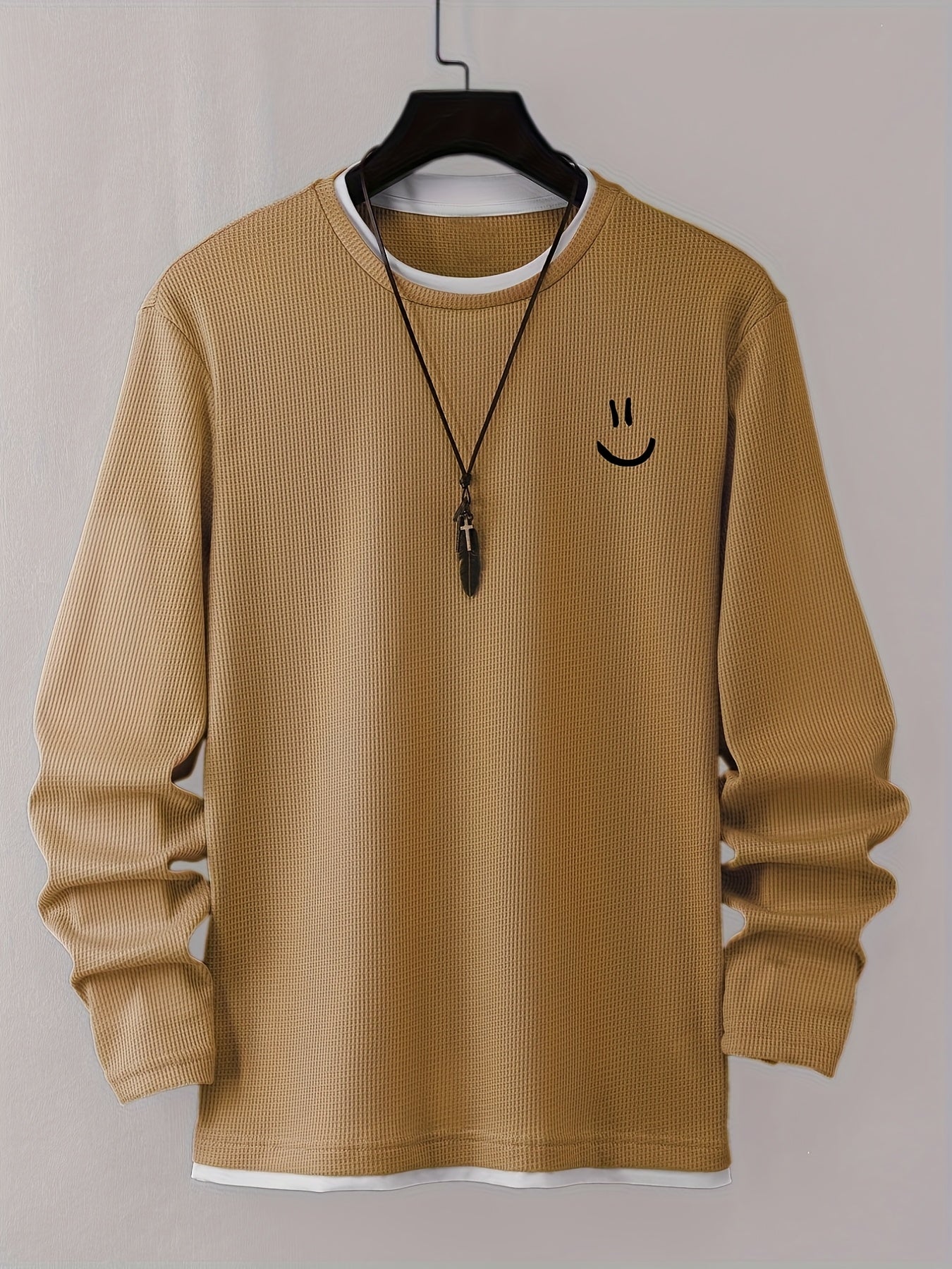 Pull homme texturé gaufré manches longues imprimé smiley col rond