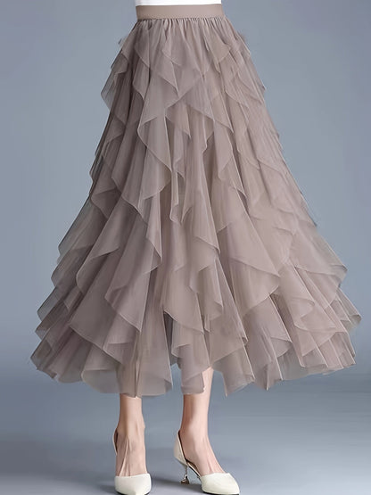 Lang flæse-nederdel i boheme-stil til kvinder, elegant og trendy, ideel til særlige lejligheder og romantiske looks