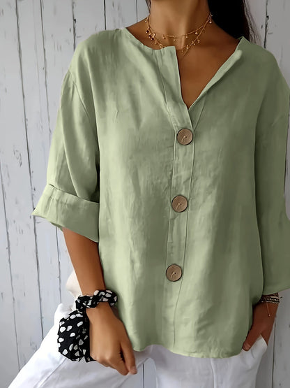 Afslappet damebluse med knapper i elegant og alsidig stil