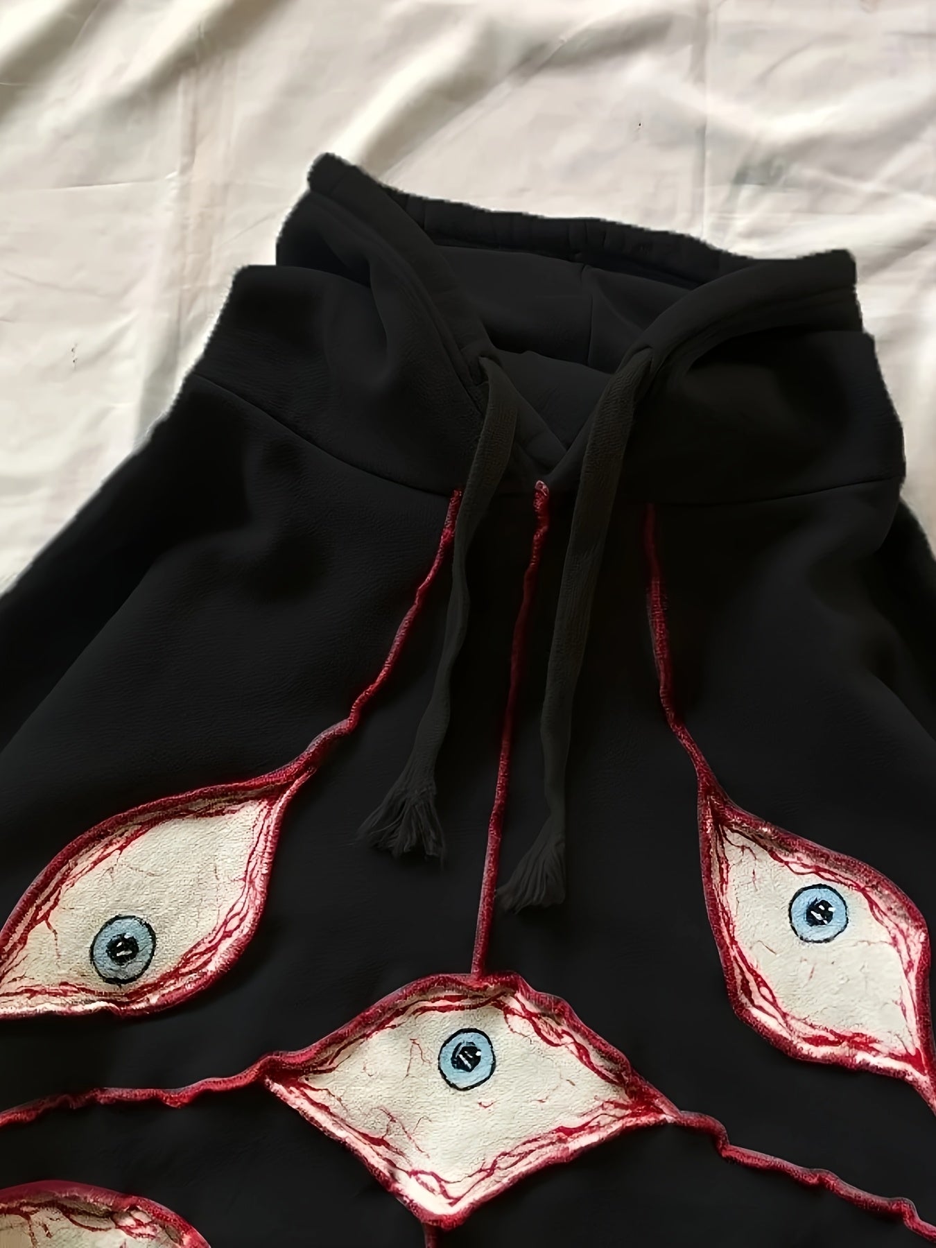 Sweat à Capuche Gris Anthracite Ample avec Motifs Yeux Stylisés