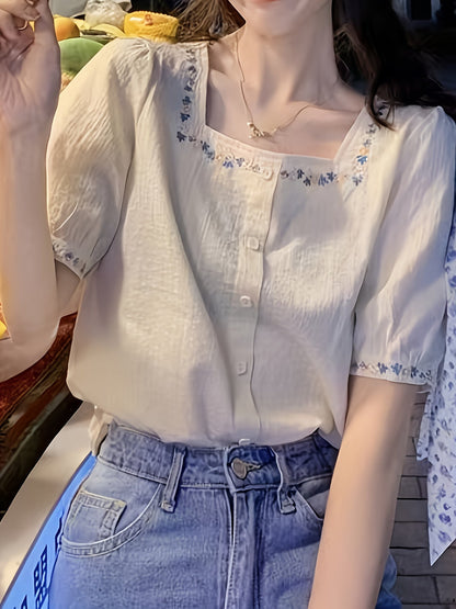 Elegant women's blouse with square neckline and floral embroidery, casual spring-summer style
