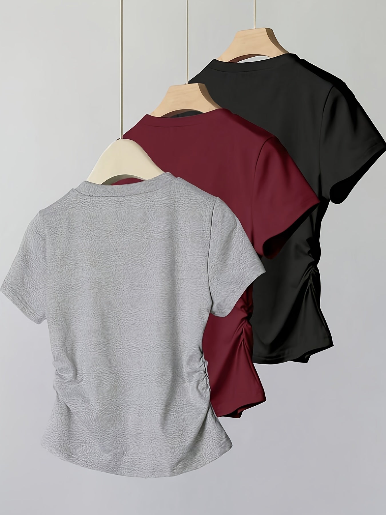 T-shirt femme casual chic à manches courtes avec nœud brodé, style élégant pour usage quotidien