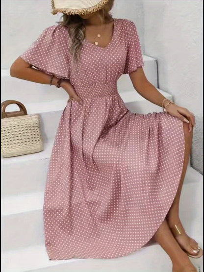Elegancka sukienka damska w groszki, styl casual na wiosnę/lato