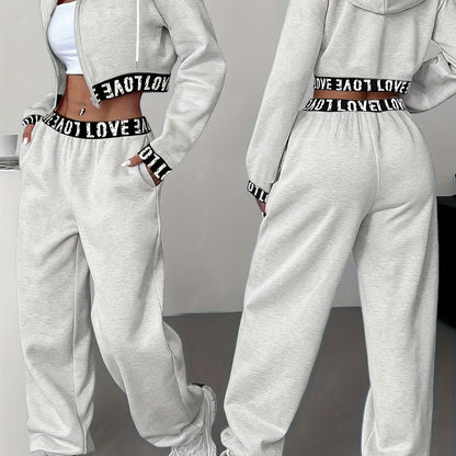 Ensemble survêtement femme crop top à capuche et pantalon large couleur unie