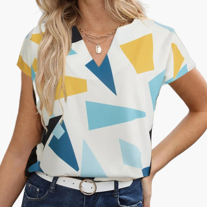 Women's vintage-style blouse with geometric pattern, ideal for everyday wear or the office