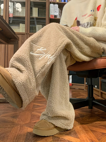 Pantalon large doux en tissu pelucheux avec broderie