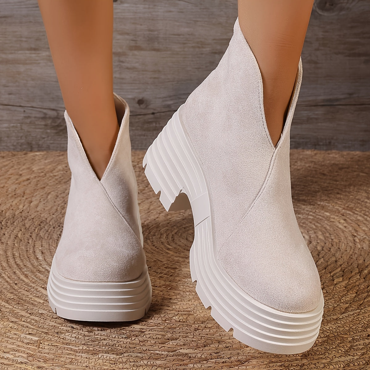 Bottes courtes compensées femme noires à semelle épaisse et fermeture éclair