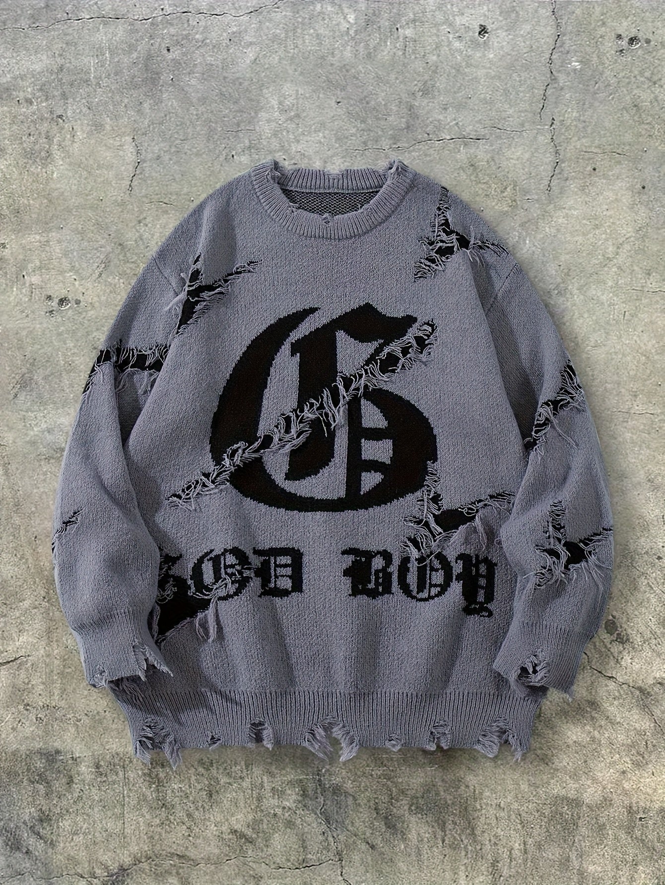 Pull homme gris déchiré oversize avec motif graphique