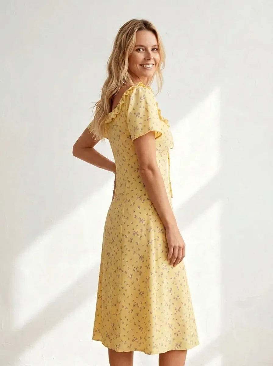 Long yellow dress with floral print and ruffled square neckline