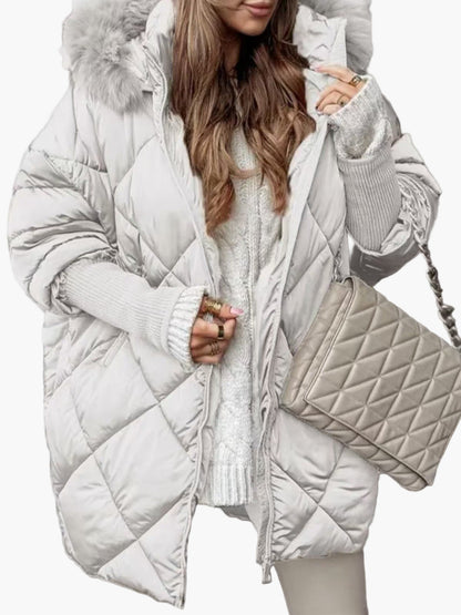 Oversized donsjas met capuchon voor dames, chique en casual stijl, ideaal voor de winter