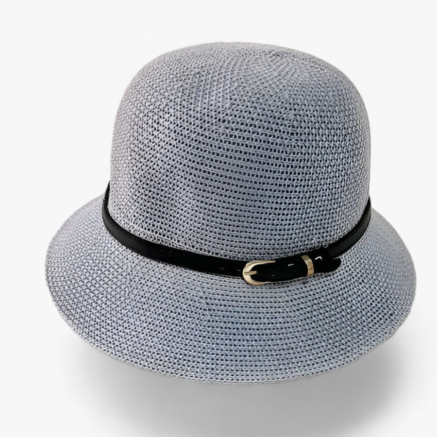 Cloche hat with decorative band and buckle