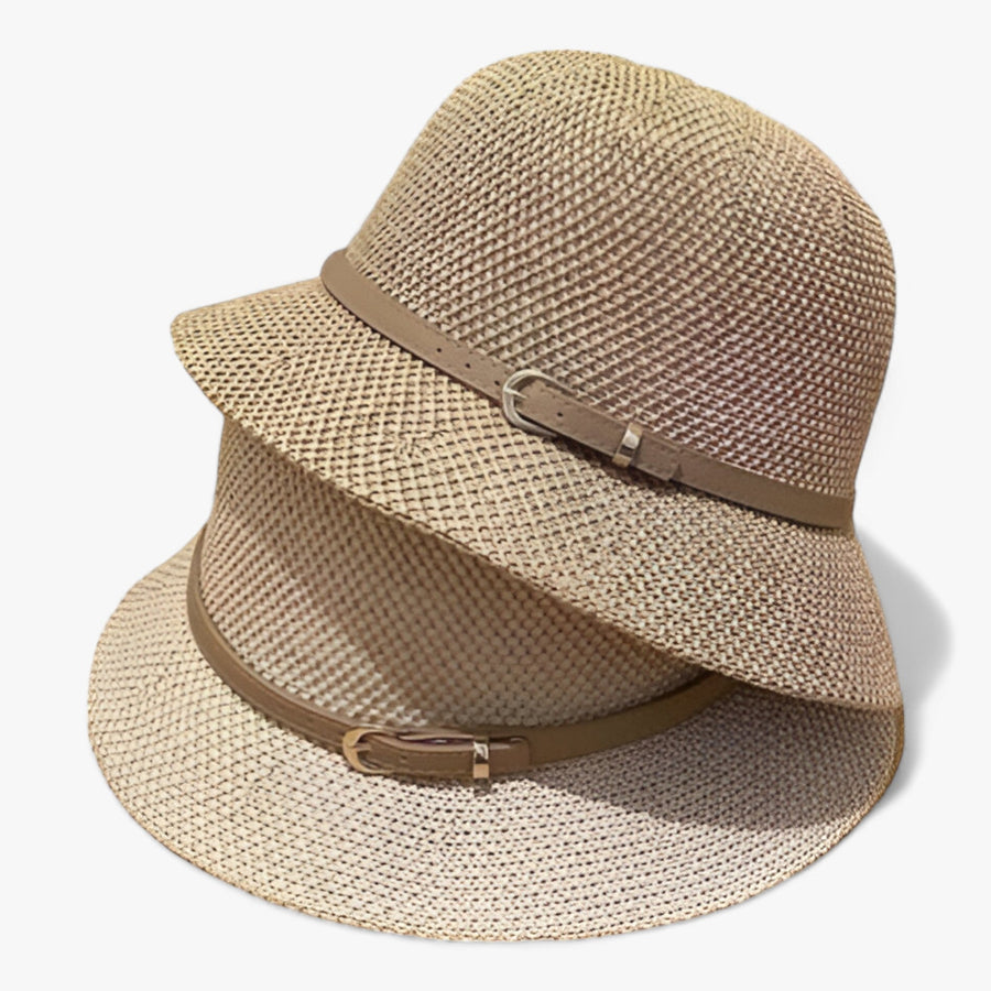 Cloche hat with decorative band and buckle