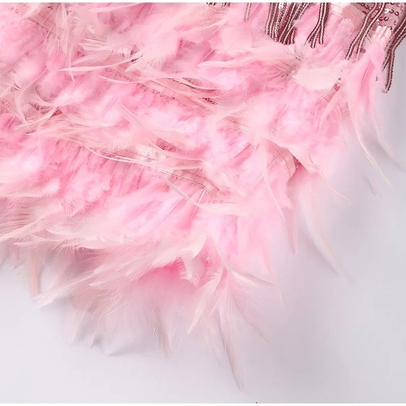 Robe de cocktail femme style années 20 à franges pour soirées élégantes